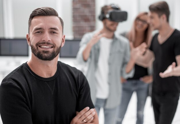 Cheerful colleagues testing virtual reality glasses