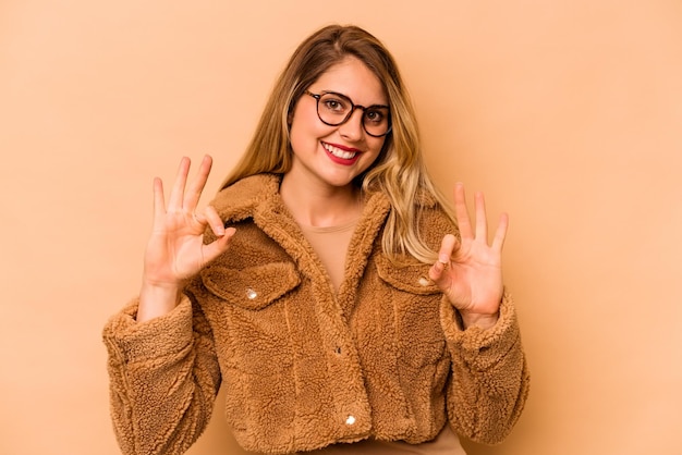 Cheerful and confident showing ok gesture