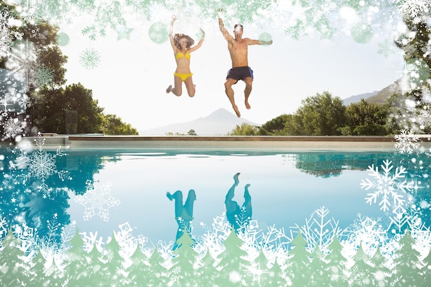 Photo cheerful couple jumping into swimming pool against snow