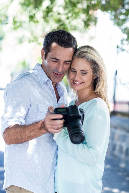Cheerful couple looking in camera