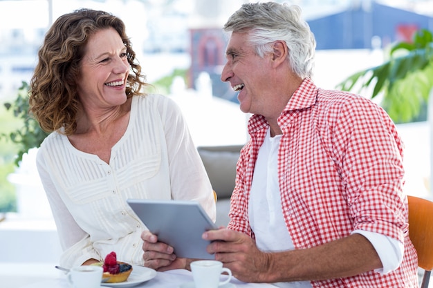 Cheerful couple in restaurant