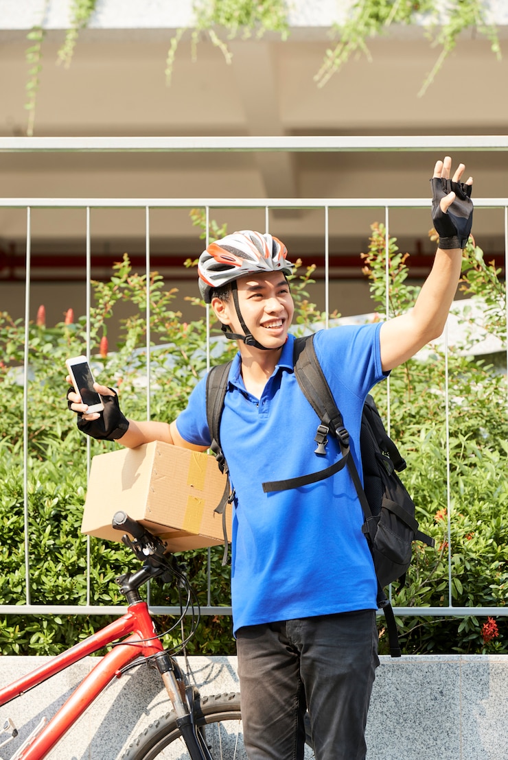 Photo 自転車で陽気な宅配便