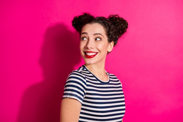Cheerful cute girl on a pink background