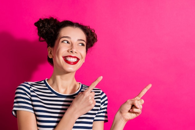 Cheerful cute girl on a pink background