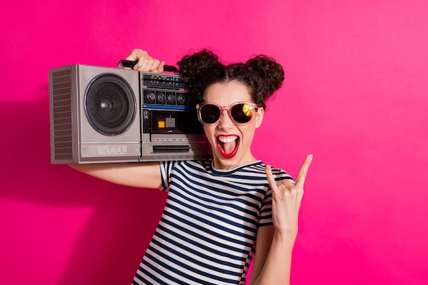 Cheerful cute girl on a pink background