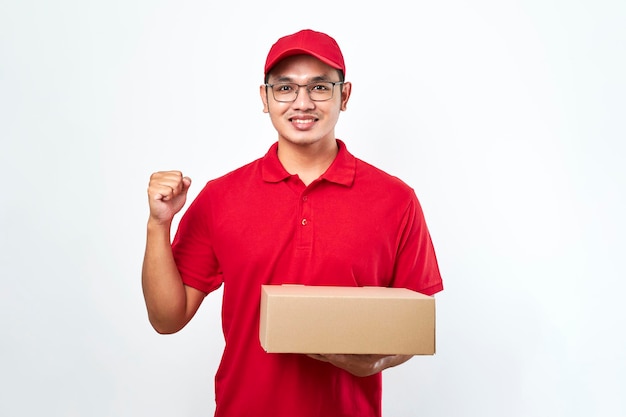 Cheerful delivery guy fist pump celebrating as deliver parcel box to client house and got huge tips for courier service