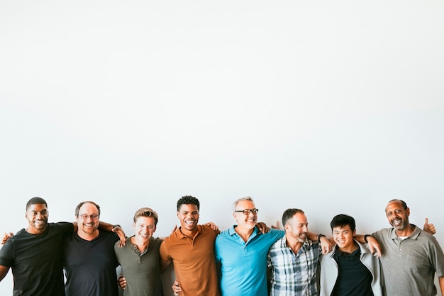 Cheerful diverse men standing in a line