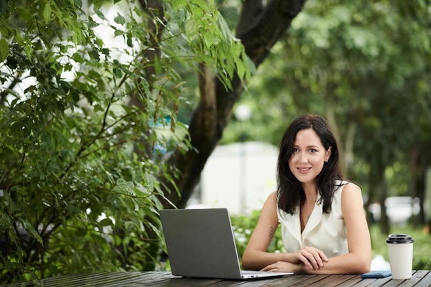 Cheerful elegant businesswoman