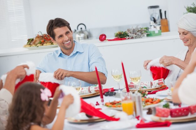 Cheerful family dining together