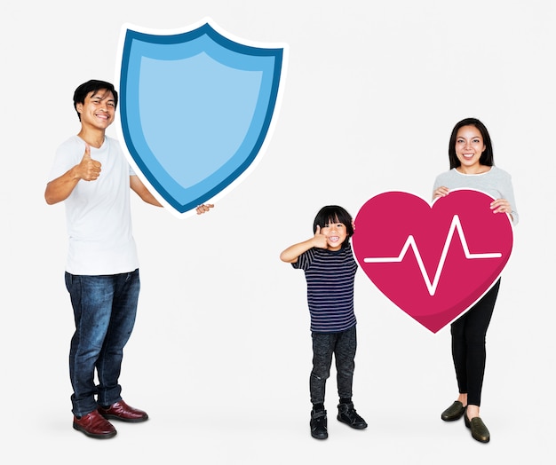 Photo cheerful family holding life insurance icons