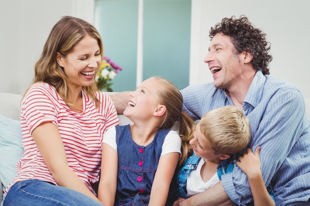 Cheerful family on sofa