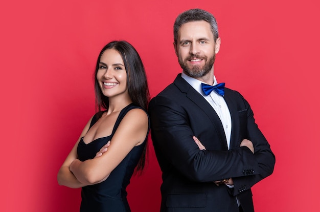 Photo cheerful formalwear couple on background photo of formalwear couple wear tuxedo