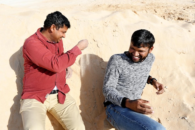 Cheerful friends enjoying at desert