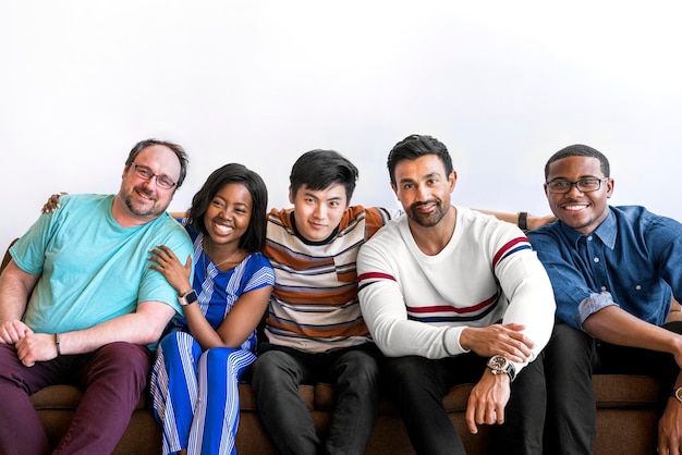 Cheerful friends sitting on a couch