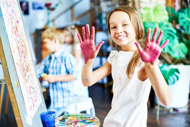 Cheerful Girl at Art Studio