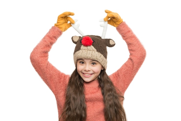 Cheerful kid. Playful cutie. Adorable baby wear cute winter knitted hat. Cute reindeer with red nose. Cute accessories. Girl wear winter theme accessory. Christmas time. Fun and joy. Festive spirit.