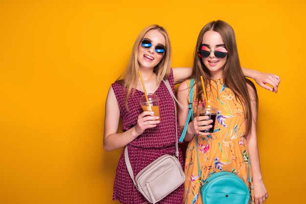 Cheerful ladies with drinks