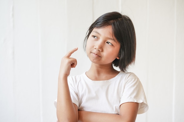 Cheerful little girl  on white 