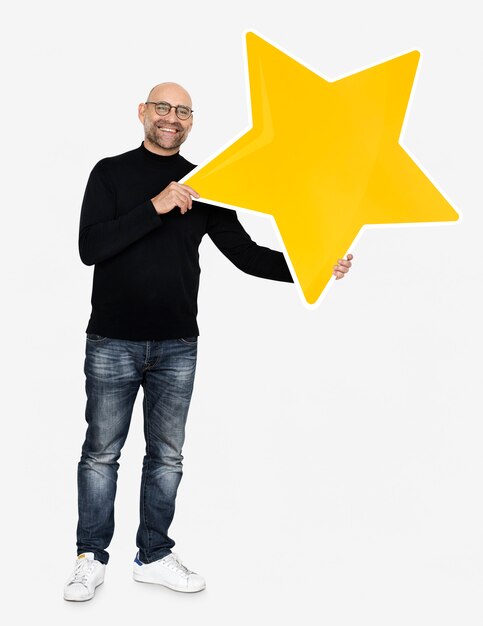 A cheerful man holding a star icon