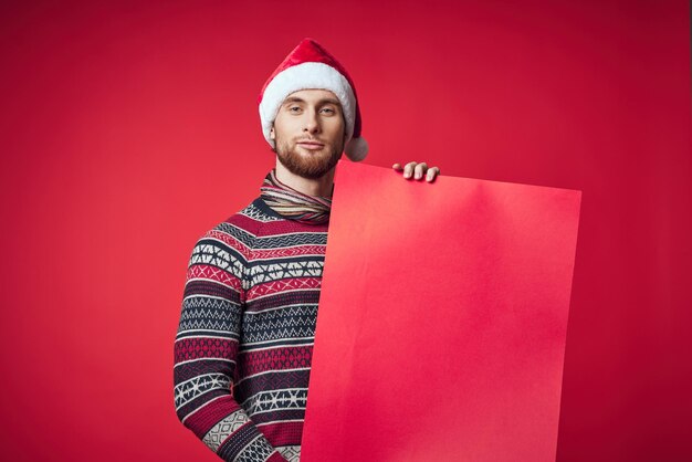 Photo cheerful man in new year's clothes advertising copy space studio posing high quality photo