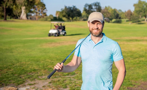 Cheerful man portrait playing golf game on green grass golfing