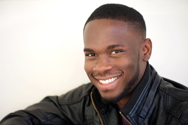 Cheerful man smiling outside on a Autumn day