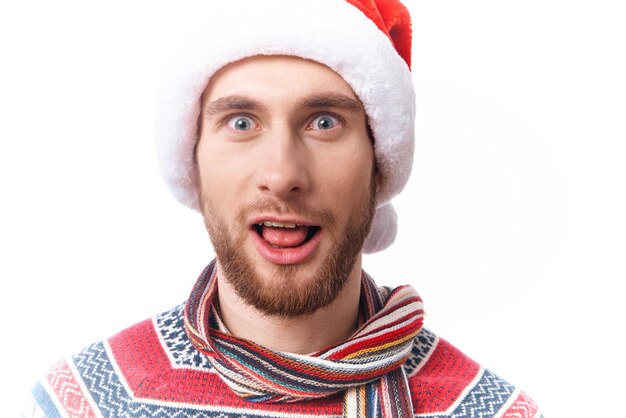 Cheerful Man Wearing Santa Hat Holiday Christmas Decorations High quality photo