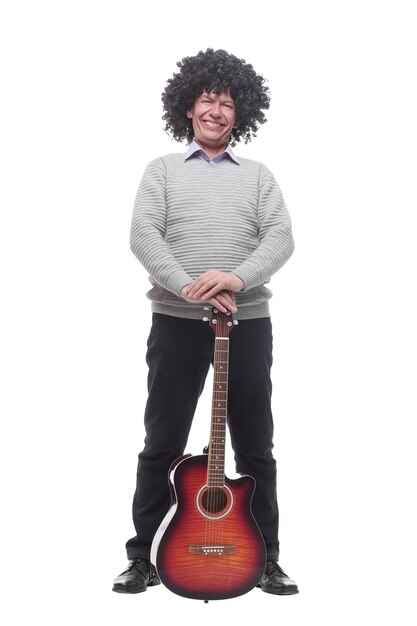 Cheerful man with a guitar isolated on a white