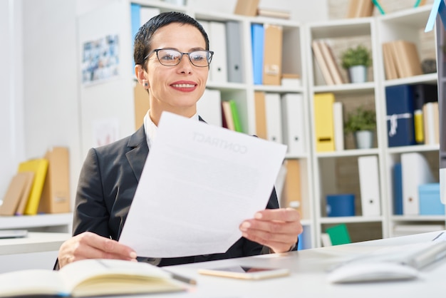 Cheerful Manager Focused on Work