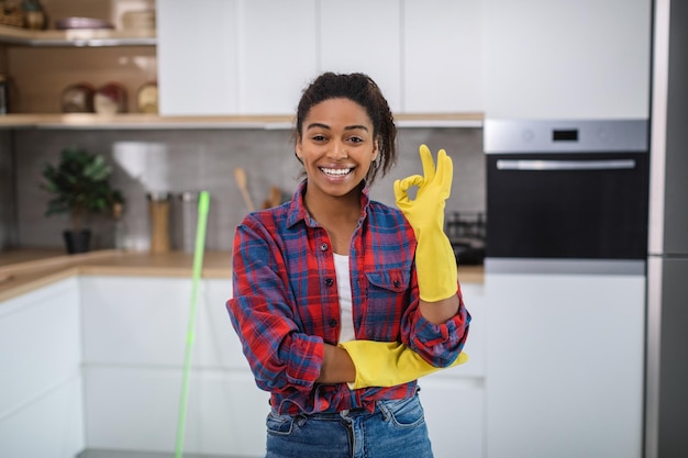 Premium Photo Cheerful millennial black woman housewife in