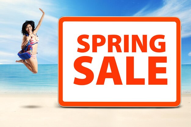 Cheerful model celebrate spring sale