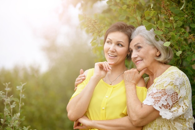 Cheerful mother and adult daughter