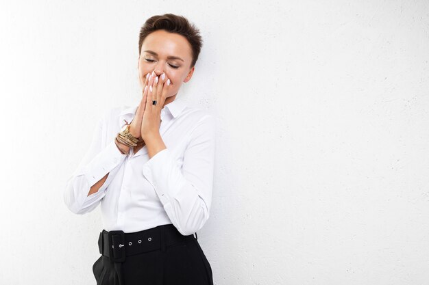 Cheerful office lady worries about work, isolated on white