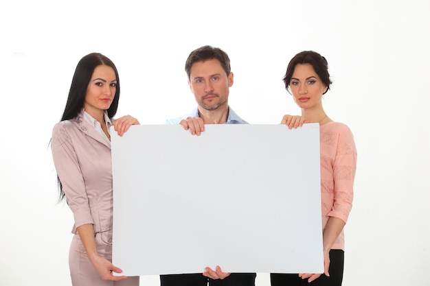 Cheerful  people holding copy space and smiling while isolated on white