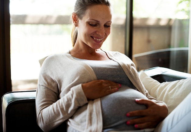 A cheerful pregnant woman