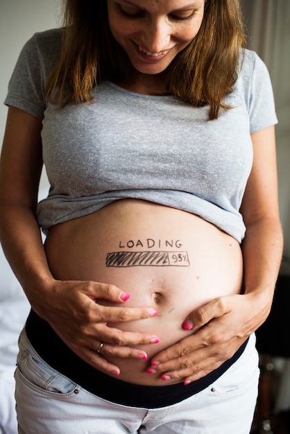 A cheerful pregnant woman