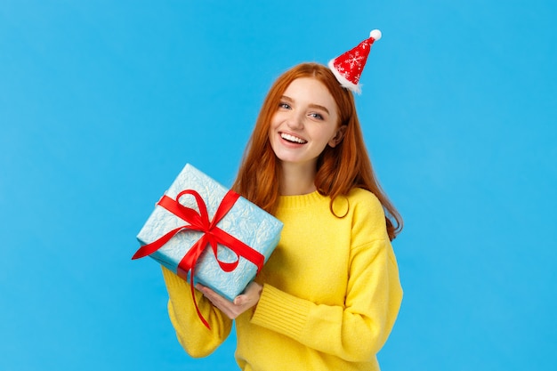 Cheerful redhead woman love christmas, enjoy celebrating with friends