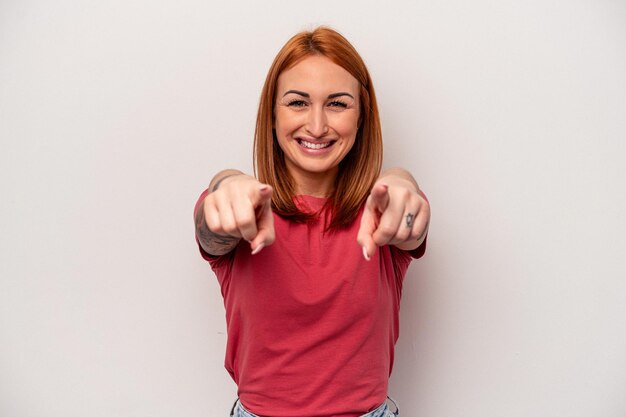 Cheerful smiles pointing to front