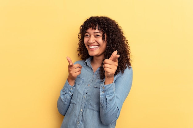 Cheerful smiles pointing to front