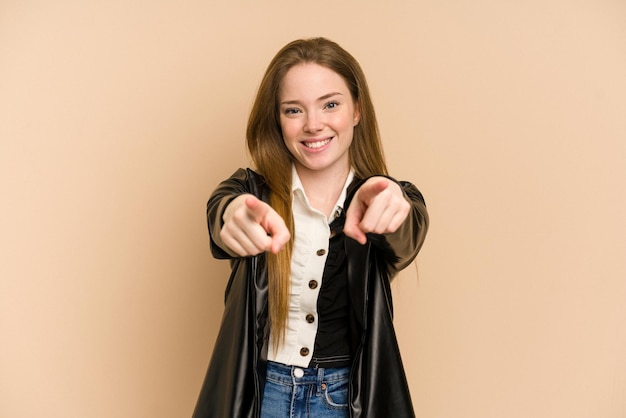 Cheerful smiles pointing to front