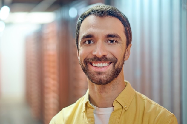 cheerful smiling man in utility room