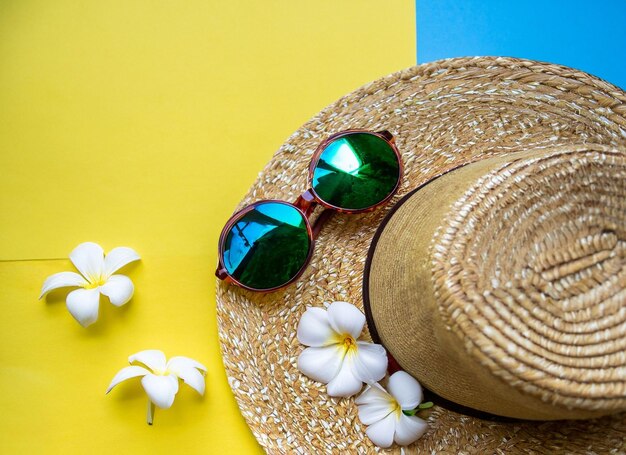 A cheerful summer composition of a single hat sunglasses