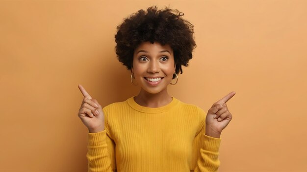 Cheerful surprised young pretty african american woman points at herself asks who me smiles broadly