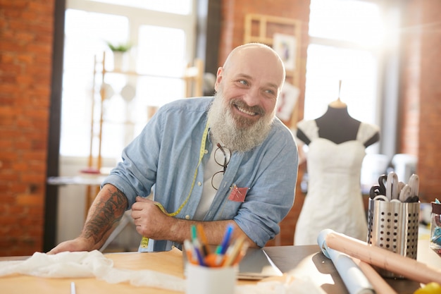 Premium Photo | Cheerful tailor