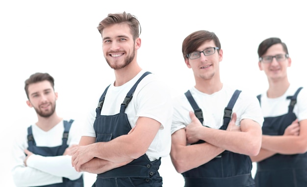 Cheerful team of responsible movers isolated on white background