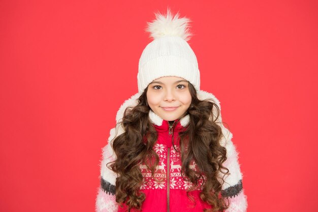 Cheerful teen girl in warm winter clothing on christmas holidays christmas fashion