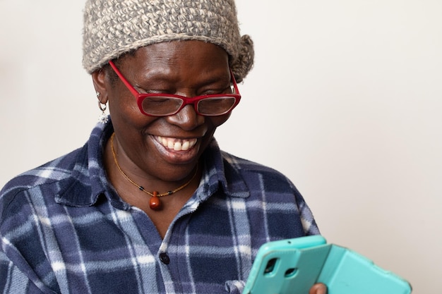 Cheerful woman hold smartphone