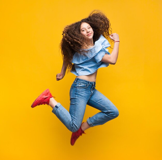 Cheerful woman jumping