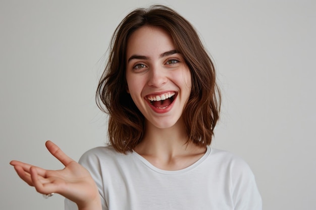 Cheerful woman with open hand and expressive face
