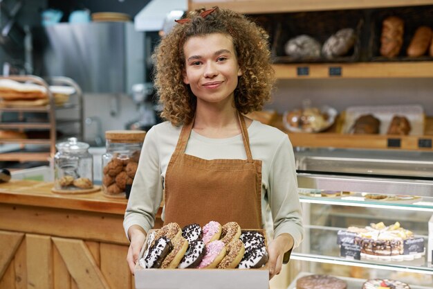 Cheerful Young Bakery Owner